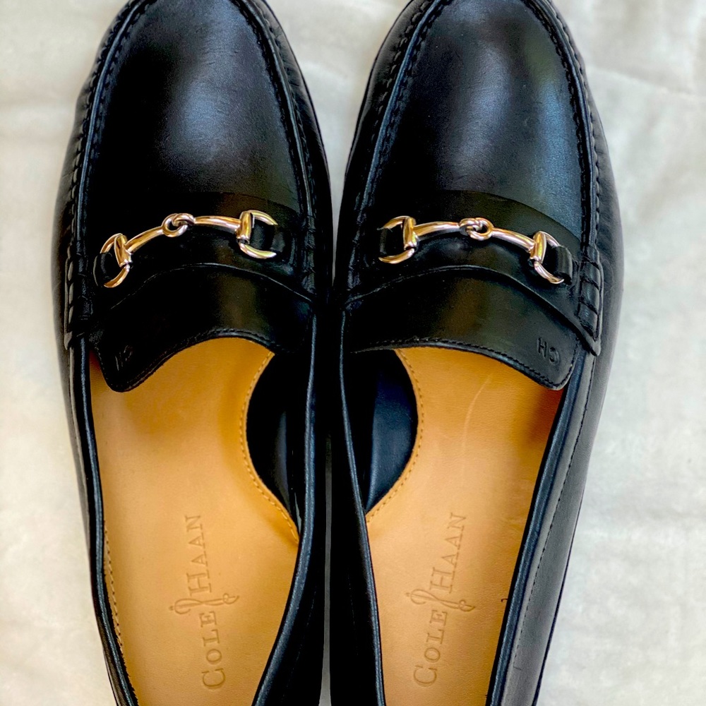 New Men’s Cole Haan Driving Loafers, size 9. Black with silver buckle.